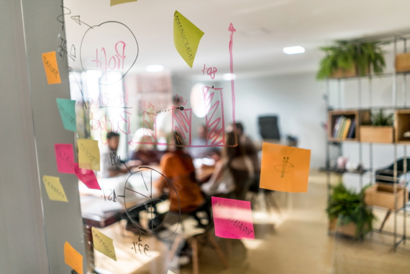 Group-of-people-in-a-business-meeting-at-a-creative-office-875024064_7952x5304